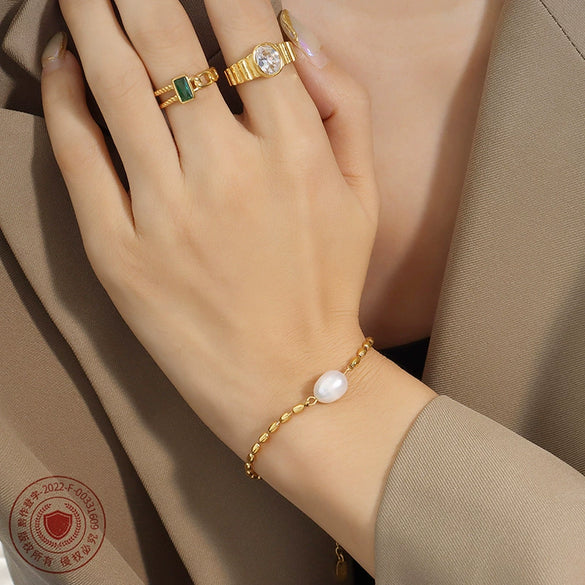 Wholesale Freshwater Pearl Stitching Rice Bead Titanium Steel Electroplated Flower Pattern Metal Chain Bracelet For Women