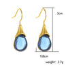 Wholesale Gems Inlaid Drop Shaped Imitation Cat's Eye Stone Fashion Earrings With Electroplating