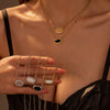 Wholesale Geometric Black Agate Inlaid Stainless Steel Necklace Pendant With 18K Gold Plated Chain For Women