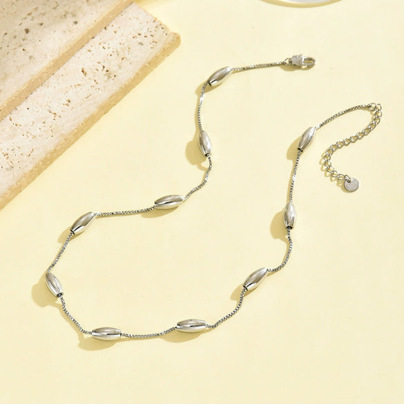 Wholesale Geometric Electroplated Stainless Steel Oval Hollow Ball Necklace For Men And Women