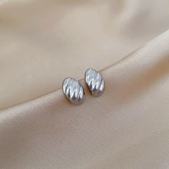 Wholesale Geometric Electroplated Titanium Steel Twisted Eggshaped Minimalist Earrings For Men And Women