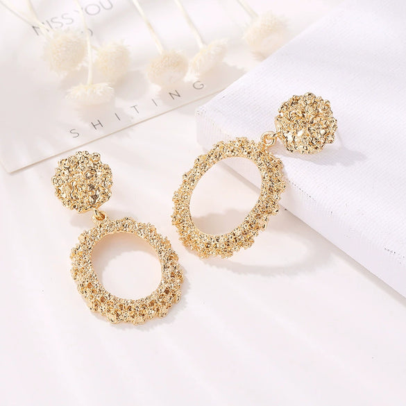 Wholesale Geometric Exaggerated Circle Relief Frosted Alloy Earrings For Ladies With Electroplating Treatment