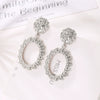Wholesale Geometric Exaggerated Circle Relief Frosted Alloy Earrings For Ladies With Electroplating Treatment