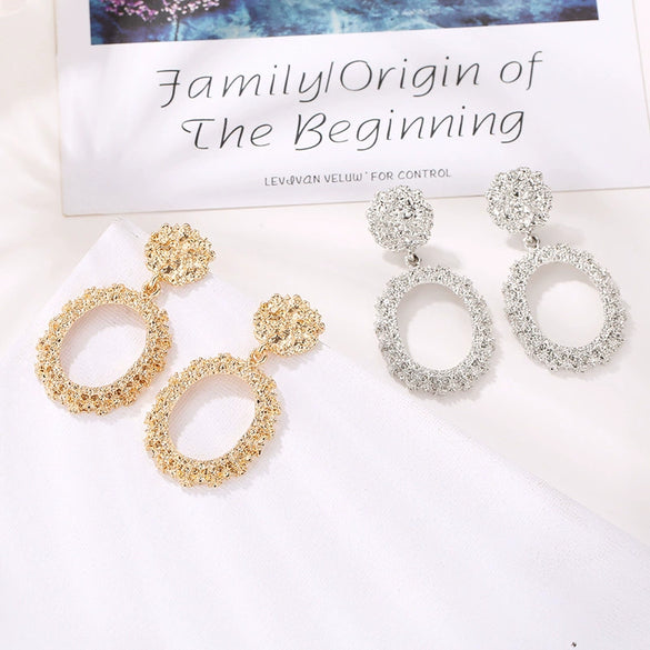 Wholesale Geometric Exaggerated Circle Relief Frosted Alloy Earrings For Ladies With Electroplating Treatment