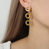 Wholesale Geometric Glossy Ring Stitching Design Titanium Steel Goldplated Unisex Jewelry Suit With Earrings