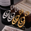 Wholesale Geometric Irregular Loop Winding Titanium Steel Goldplated Nonfading Earrings For Women With Electroplating Design