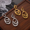 Wholesale Geometric Irregular Loop Winding Titanium Steel Goldplated Nonfading Earrings For Women With Electroplating Design