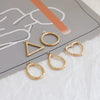 Wholesale Geometric Pleated Oval Water Drops Love Style Copper Clad Gold Electroplated Handmade Earrings