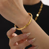 Wholesale Geometric Stitching Buckle Bracelet In Stainless Steel With 18K Gold Plated Electroplating