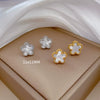 Wholesale Geometric Titanium Steel Fiveleaf Flower Normcore Style Electroplated Earrings For Men And Women