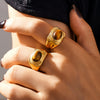 Wholesale Geometric Vintage Textured Edge Oval Tiger Eye Stone Ring Titanium Steel Goldplated