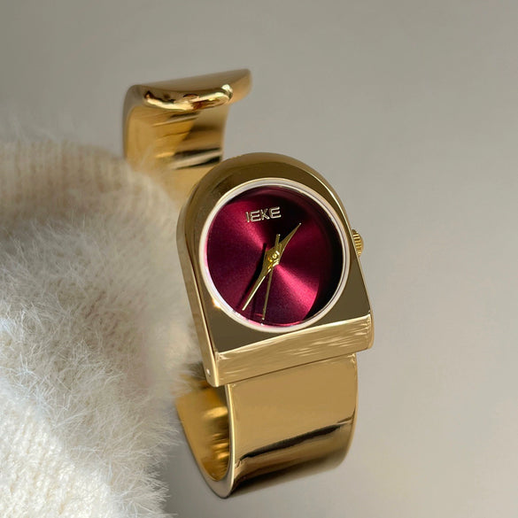 Wholesale Goldcolored Bell Clock Braceletstyle Alloy Watch With Round Dial For Women