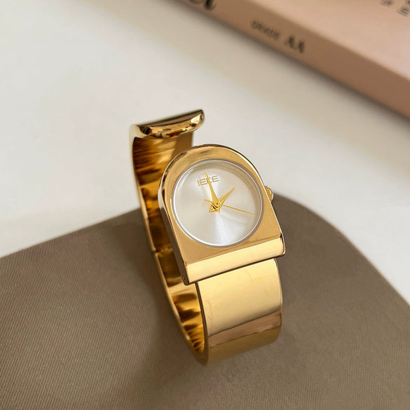 Wholesale Goldcolored Bell Clock Braceletstyle Alloy Watch With Round Dial For Women
