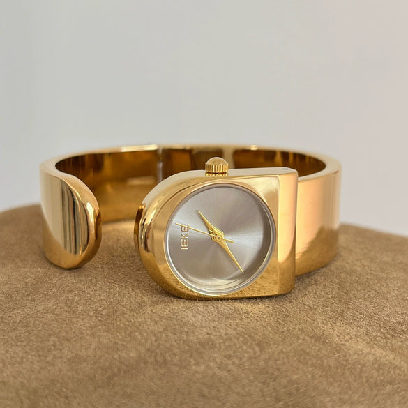 Wholesale Goldcolored Bell Clock Braceletstyle Alloy Watch With Round Dial For Women