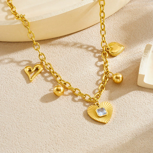 Wholesale Goldplated Stainless Steel Heart Shape Hollow Pendant With O Word Chain Necklace For Women