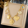 Wholesale Goldplated Stainless Steel Palace Style Heartshaped Pendant Necklace With Cross Round Chain For Women