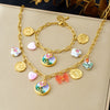 Wholesale Goldplated Stainless Steel Retro Enamel Filigree Plants And Flowers Pattern Round Butterfly Jewelry Set For Women
