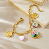 Wholesale Goldplated Stainless Steel Retro Enamel Filigree Plants And Flowers Pattern Round Butterfly Jewelry Set For Women