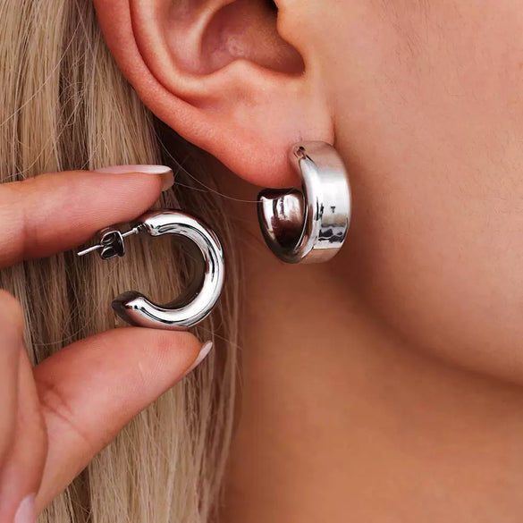 Wholesale Goldplated Titanium Steel Geometric Hollow 3D Exaggerated Ferris Wheel Unisex Earrings