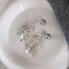 Wholesale Highend Feel Geometric Pearl Zircon Earrings With Electroplating