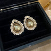 Wholesale Highend Feel Geometric Pearl Zircon Earrings With Electroplating