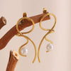 Wholesale Highend Women's Stainless Steel 18K Gold Plated Geometric Knotted Line Imitation Pearl Earrings