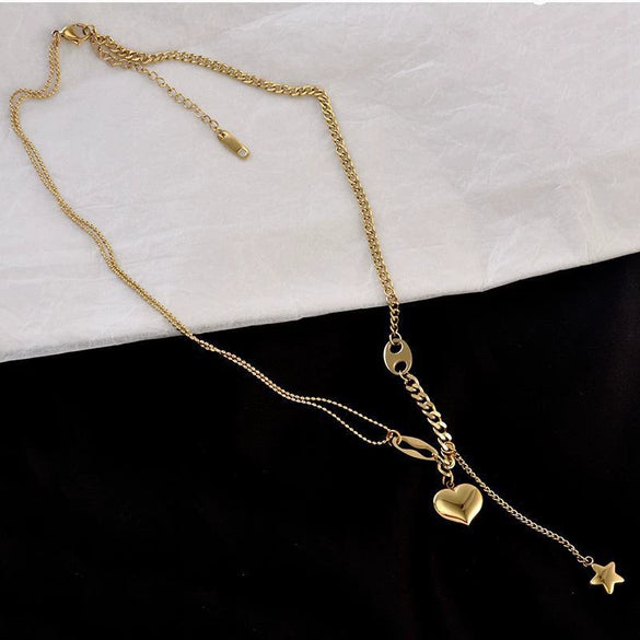 Wholesale Hiphop Threedimensional Peach Heart Titanium Steel Necklace With Fivepointed Star Tassel And Electroplating Treatment For Women