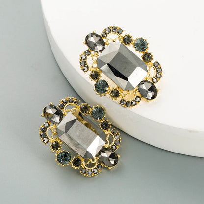 Wholesale Hollow Alloy Inlaid Glass Rhinestone Earrings