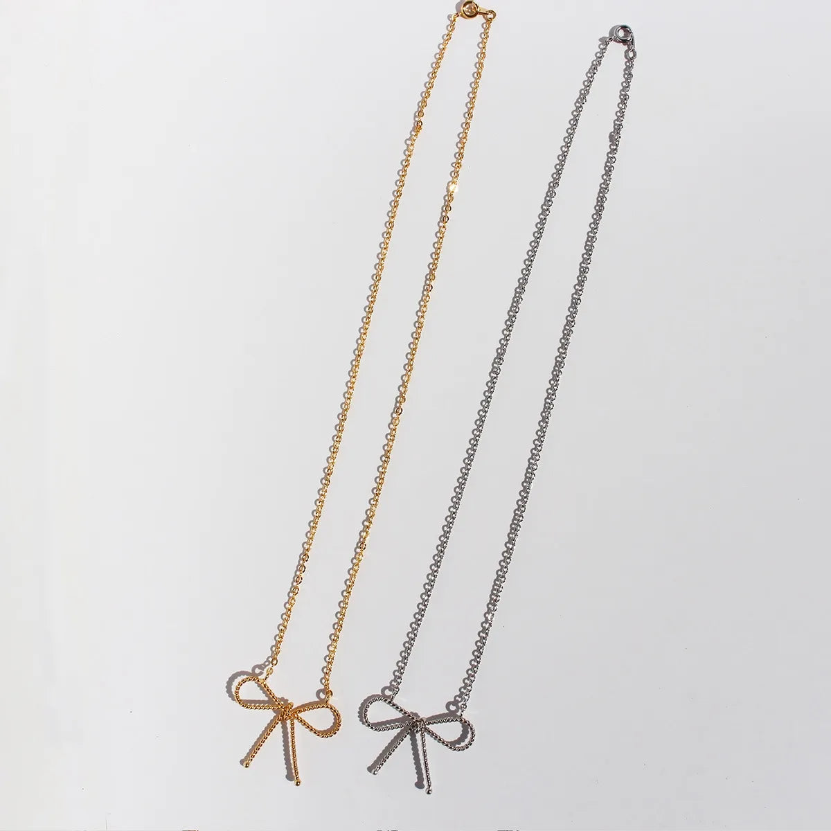 Wholesale IG Style Sweet Bow Knot Brass 18K Gold Plated Necklace