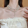 Wholesale Imitation Pearl Water Drop Love Bell French Retro Clavicle Chain Necklace And Earrings Set With Pearls