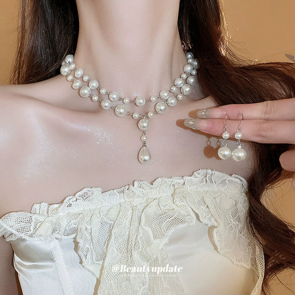 Wholesale Imitation Pearl Water Drop Love Bell French Retro Clavicle Chain Necklace And Earrings Set With Pearls