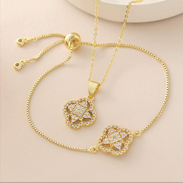 Wholesale Ins Style Copper Electroplated 18K Gold Four Leaf Clover Pendant Necklace And Bracelet Set