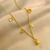 Wholesale Ins Style Women's Jewelry Titanium Steel Necklace With Clover Pendant And Plants And Flowers Pattern Electroplated Design