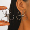 Wholesale Iron Flower Hollow Electroplated Women's Earrings
