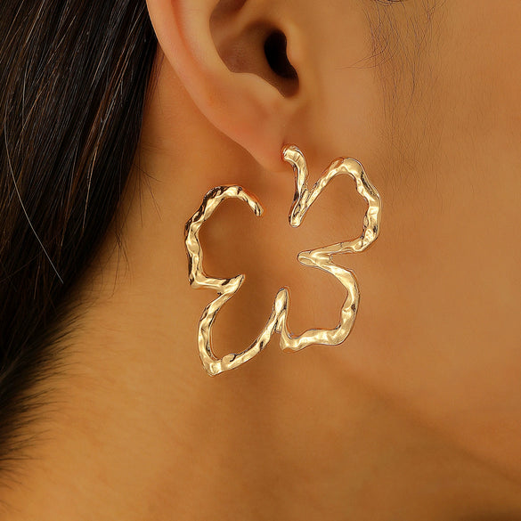 Wholesale Iron Flower Hollow Electroplated Women's Earrings