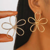 Wholesale Iron Flower Hollow Electroplated Women's Earrings