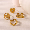 Wholesale Irregular Heartshaped Concaveconvex Surface Geometric Opening Ring In Stainless Steel With 18K Furnace Vacuum Plating For Women