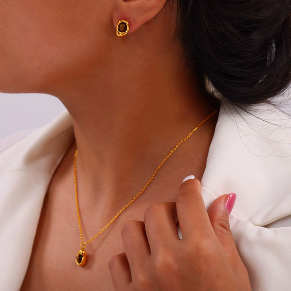 Wholesale Irregular Small Gold Bean Pendant Inlaid With Natural Tiger's Eye Stone Titanium Steel Earrings And Necklace Suit With Niche Design And Electroplating