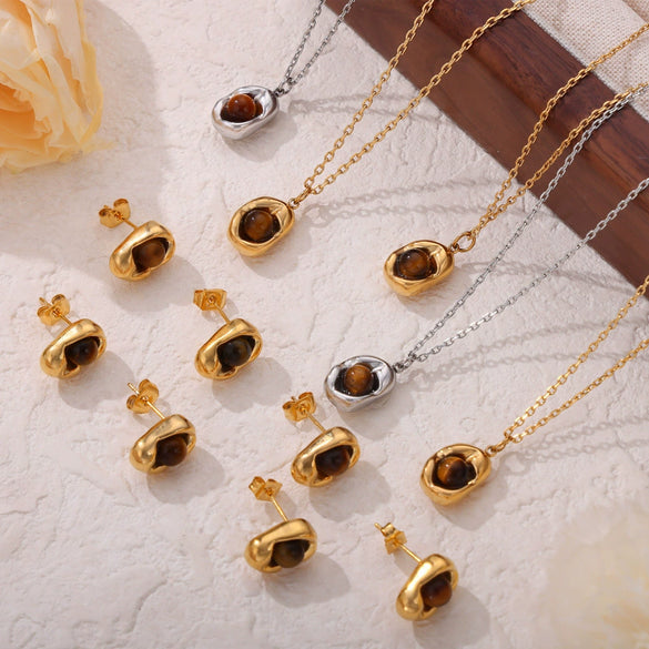Wholesale Irregular Small Gold Bean Pendant Inlaid With Natural Tiger's Eye Stone Titanium Steel Earrings And Necklace Suit With Niche Design And Electroplating