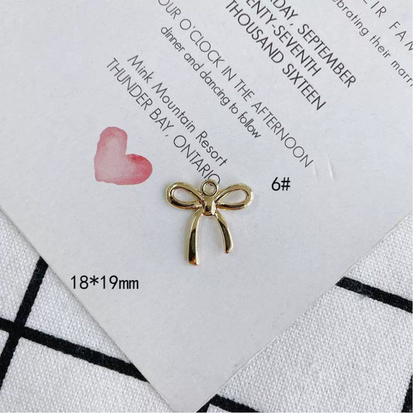 Wholesale Jewelry Accessories Alloy Bow Pendant Electroplated For Earrings Necklaces And Bracelets