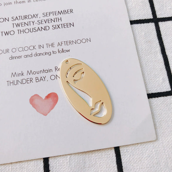 Wholesale Jewelry Accessories Alloy Electroplated Abstract Face Pendant Earrings