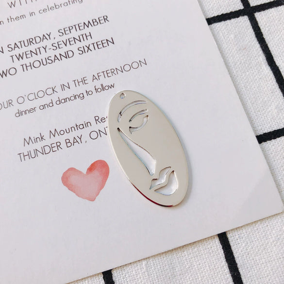 Wholesale Jewelry Accessories Alloy Electroplated Abstract Face Pendant Earrings