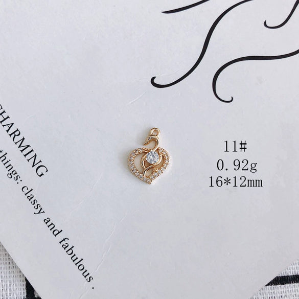 Wholesale Jewelry Accessories Copper And Zircon Inlaid Love Moon Wings Cross Pendant