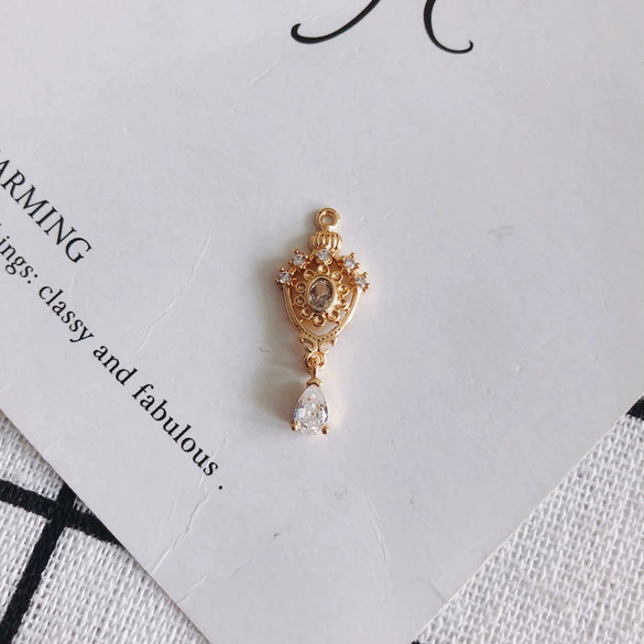Wholesale Jewelry Accessories Copper Real Gold Plated Micro Inlaid Zircon Crown Hollow Drop Shaped Pendant