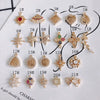 Wholesale Jewelry Accessories Copper Zircon Inlaid Star Bow Four Leaf Clover Hollow Pendant