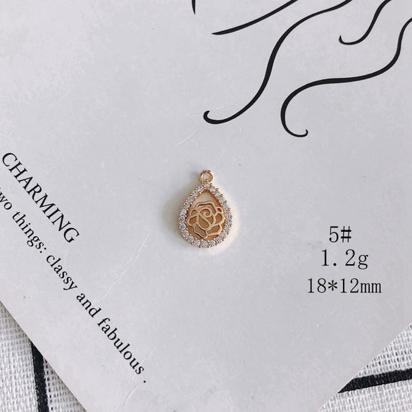 Wholesale Jewelry Accessories Copper Zircon Inlaid Star Bow Four Leaf Clover Hollow Pendant