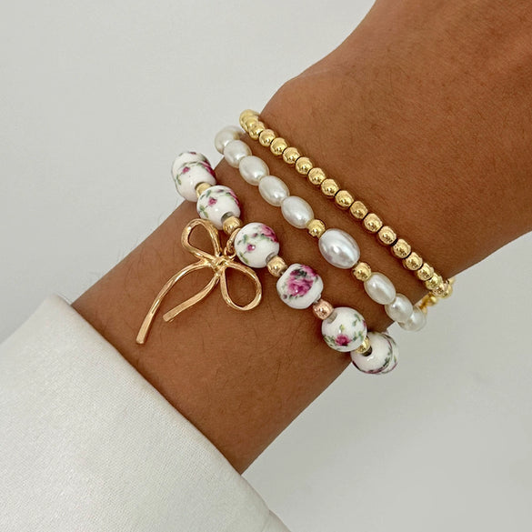 Wholesale Jewelry Alloy Beaded Stacked Bow And Star Pendant Bracelet For Women With Electroplating