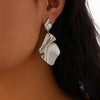 Wholesale Jewelry Alloy Exaggerated Geometric Heart Earrings With Sunflower Pattern Electroplated
