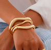 Wholesale Jewelry Alloy Geometric Hollow Pleated Ring And Irregular Cambered Bracelet Set With Electroplating