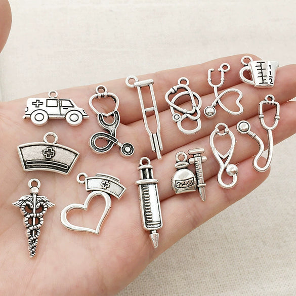 Wholesale Jewelry Alloy Simple Style Electroplated Syringe Stethoscope Ambulance Nurse Cap Electrocardiogram Double Rod Shaped Bracelets Necklaces Pendants Accessories